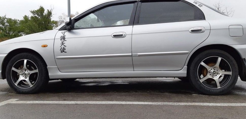 Пластиковые накладки на пороги Kia Spectra (2000 - 2011)